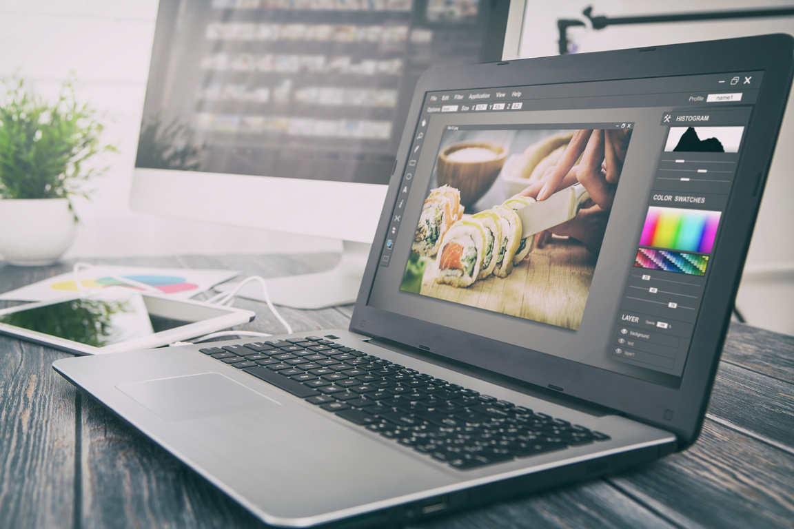 Photographer's Laptop with Photo Edit Programs